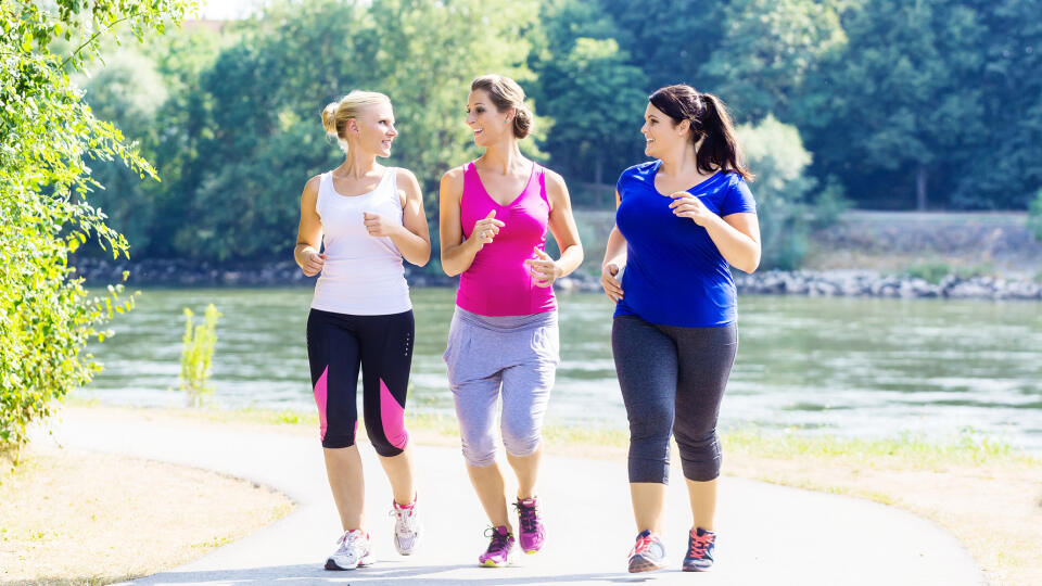 Group,Of,Women,Running,At,Lakeside,Jogging