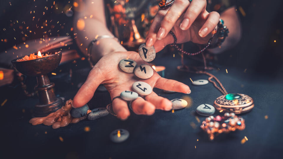 Astrology,And,Esotericism.,The,Witch,Puts,The,Rune,Stones,In