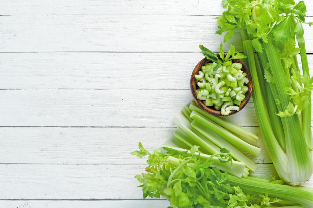Sliced,Celery,On,A,White,Background,Wooden.,Healthy,Food.,Top