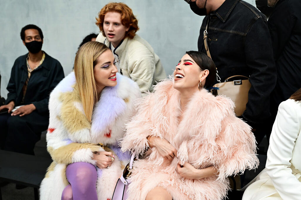 Italian blogger Chiara Ferragni (L) discusses with a visitor prior to the Fendi catwalk show for the Women Fall/Winter 2022/2023 collection on the second day of the Milan Fashion Week in Milan on February 23, 2022.,Image: 664452702, License: Rights-managed, Restrictions: , Model Release: no, Credit line: Profimedia
