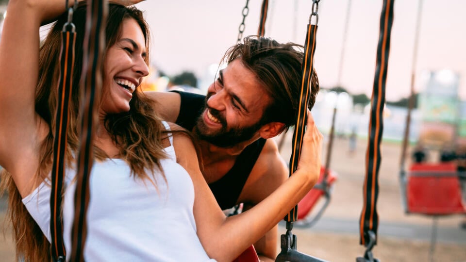 Beautiful,Happy,Couple,At,Amusement,Park.,Soft,Focus,,High,Iso,