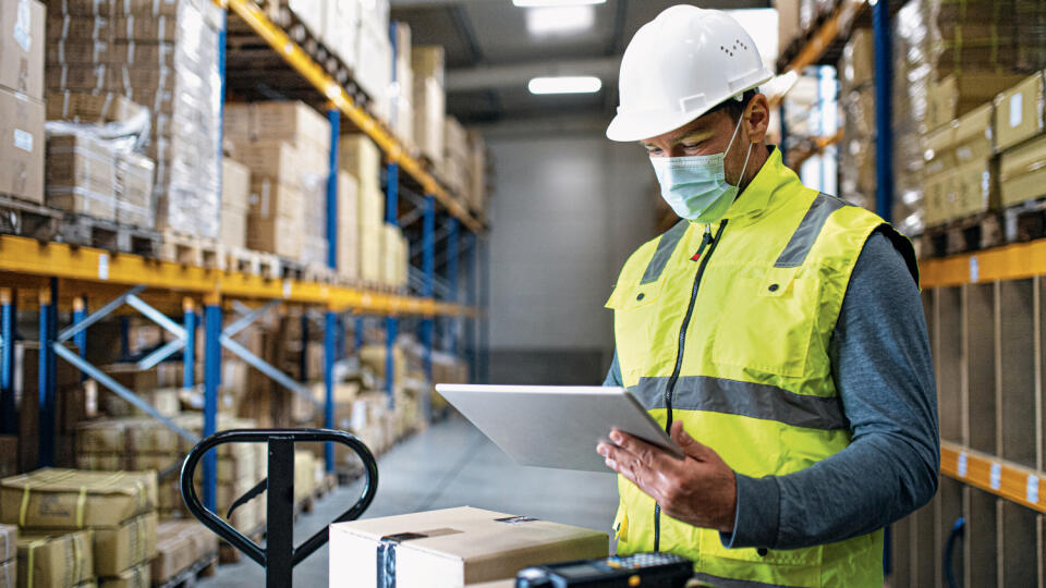 Man,Worker,With,Tablet,Working,Indoors,In,Warehouse,,Coronavirus,Concept.