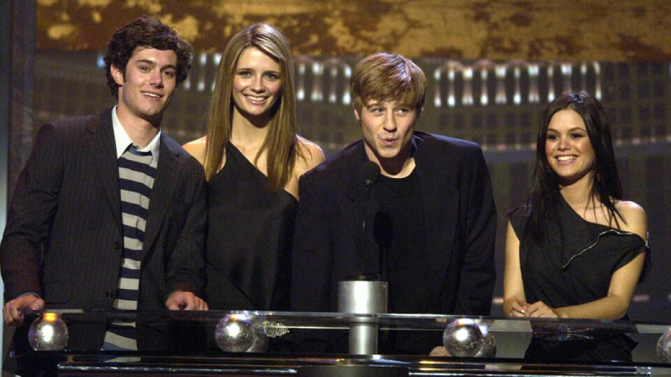 ** FILE ** Cast members of the television show "The O.C.," from left, Adam Brody, Mischa Barton, Benjamin McKenzie and Rachel Bilson appear as presenters in this Dec. 10, 2003 file photo during the Billboard Music Awards in Las Vegas. The once-hot TV series about wealthy Southern California teenagers has been canceled. The final episode of the drama will air 9 p.m. EST Thursday, Feb. 22, 2006, Fox TV and Warner Bros. Television Production Inc. said Wednesday, Jan 3. (AP Photo/Joe Cavaretta, Fi