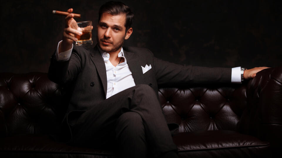 Attractive,Man,With,A,Cigar,,And,A,Glass,Of,Wine