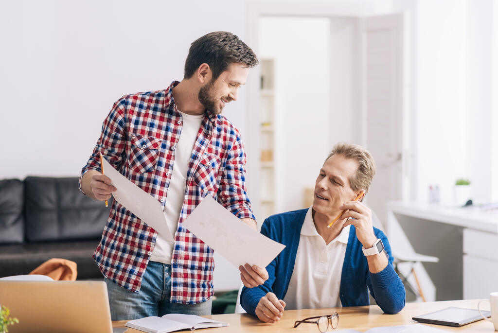 Nice,Diligent,Man,Working,With,His,Colleague,Together
