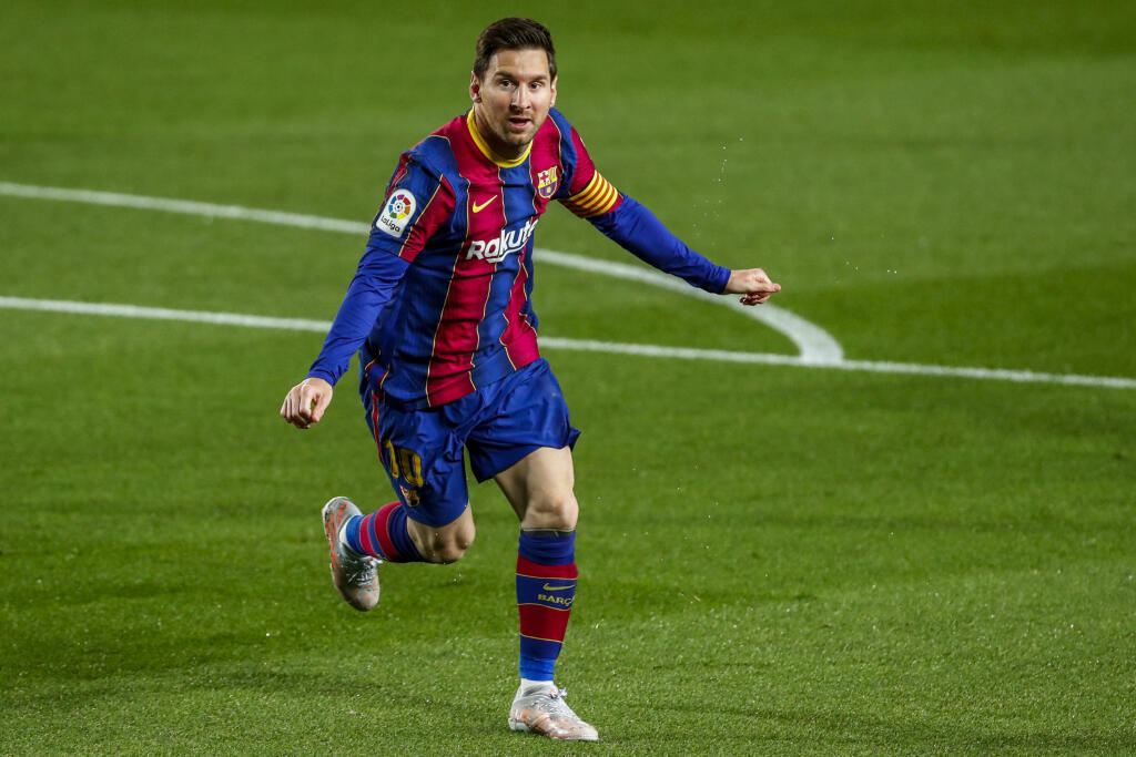 WA 2 Barcelona - Futbalista FC Barcelona Lionel Messi sa teší po strelení úvodného gólu v zápase 31. kola španielskej La Ligy FC Barcelona - Getafe CF v Barcelone vo štvrtok 22. apríla 2021. FOTO TASR/AP
Barcelona's Lionel Messi celebrates after scoring the opening goal during the Spanish La Liga soccer match between FC Barcelona and Getafe at the Camp Nou stadium in Barcelona, Spain, Thursday, April 22, 2021. (AP Photo/Joan Monfort)