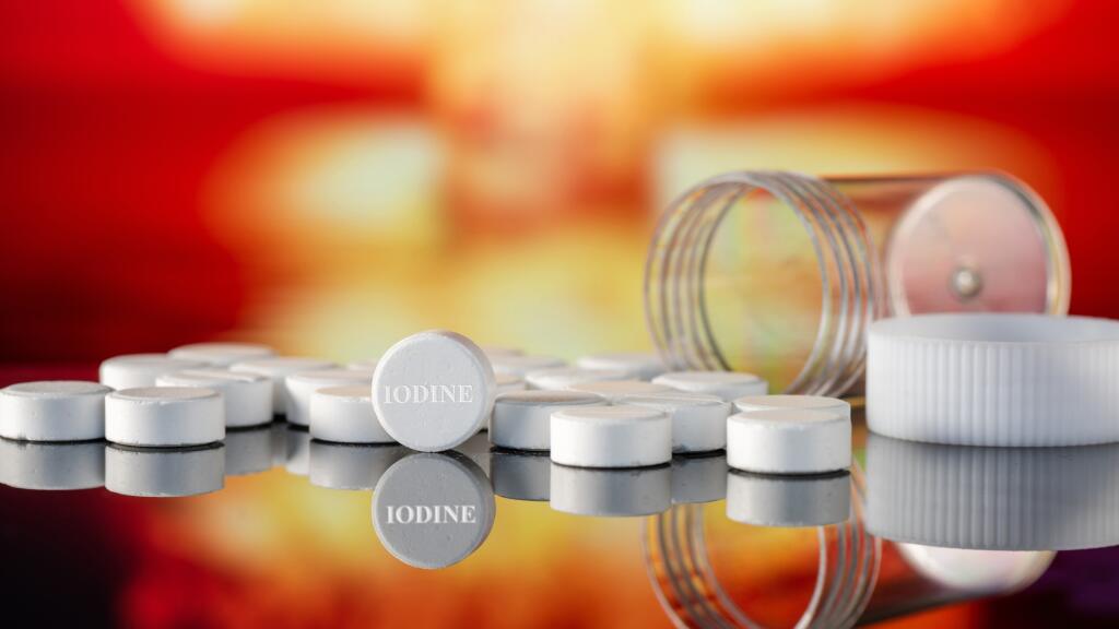 Scattered,Anti-radiation,Iodine,Pills,,An,Empty,Jar,,Nuclear,Explosion,On