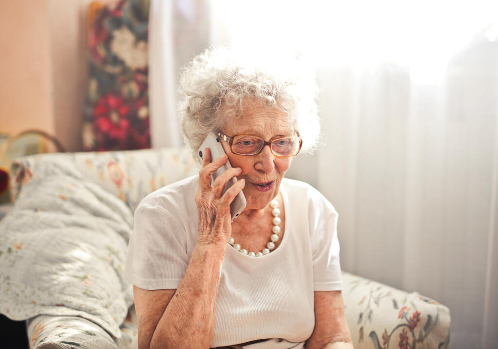 Old,Woman,Talking,Of,The,Phone