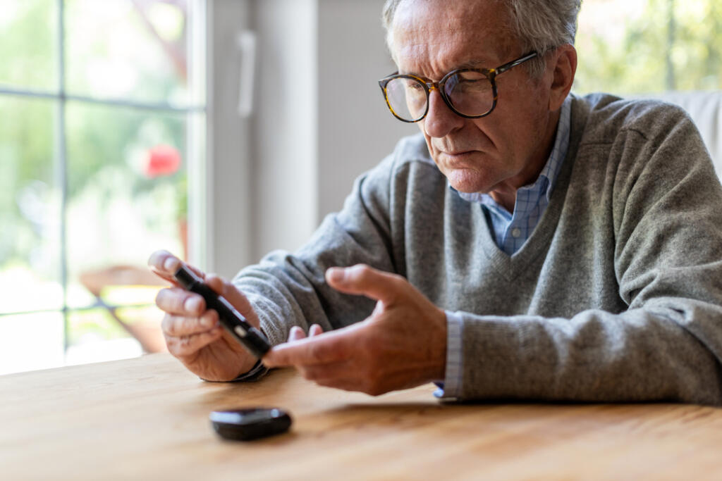 Mature,Man,Checking,Blood,Sugar,Level,With,Glucometer