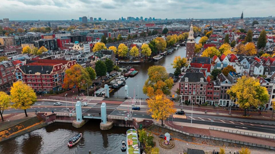 Aerial,Drone,View,Amsterdam,Autumn,Cityscape,Narrow,Old,Houses,,Canals,