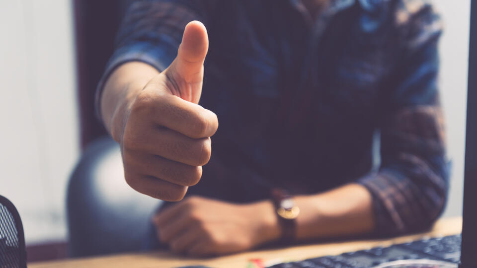 Businessman,Showing,Thumbs,Up,-,Closeup,Shot