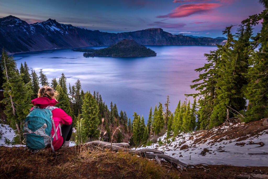Backpacker,Girl,Looking,At,Crater,Lake,At,Sunset,Wizar,Island