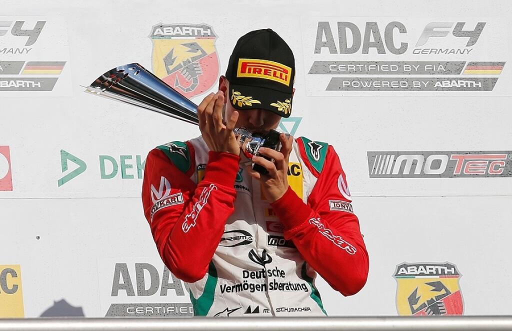 HOCKENHEIM, GERMANY - OCTOBER 02: Winner Mick Schumacher celebrates with teh trophy after the third race of ADAC Formula 4 at Hockenheimring on October 2, 2016 in Hockenheim, Germany. (Photo by Daniel Kopatsch/Bongarts/Getty Images)