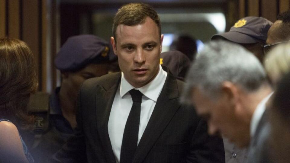 Oscar Pistorius arrives in court Monday, Oct. 13, 2014 to face sentencing for the shooting death of his girlfriend Reeva Steenkamp. Pistorius was found guilty last month on a culpable homicide charge. The defense have started arguing in mitigation of sentence. (AP Photo/Marco Longari. Pool)