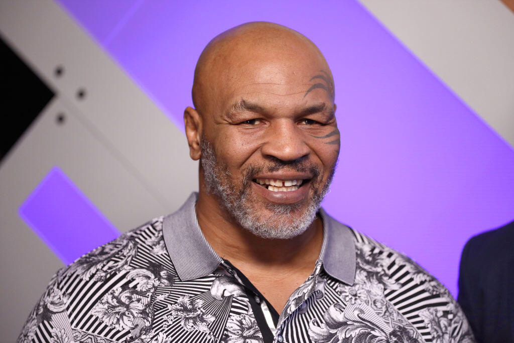 BURBANK, CALIFORNIA - JANUARY 18: (EDITORIAL USE ONLY. NO COMMERCIAL USE) Mike Tyson speaks with Mario Lopez at Capital One Podcast Studio during the 2019 iHeartRadio Podcast Awards Presented by Capital One at the iHeartRadio Theater LA on January 18, 2019 in Burbank, California. (Photo by Rich Polk/Getty Images for iHeartMedia)