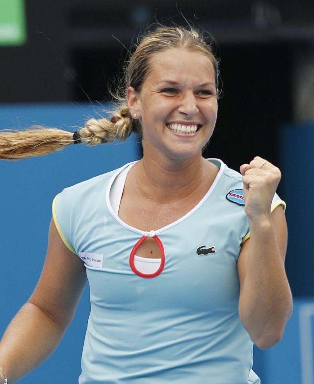 Dominika Cibulkova of Slovakia celebrates after winning her match against Caroline Wozniacki of Denmark at the Sydney International Tennis Tournament in Sydney, Australia, Tuesday, Jan. 11, 2011. (AP Photo/Rob Griffith)