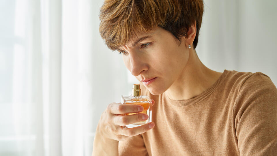 Caucasian,Woman,Inhaling,Aroma,Of,Perfume,Bottle.,Loss,Of,Smell