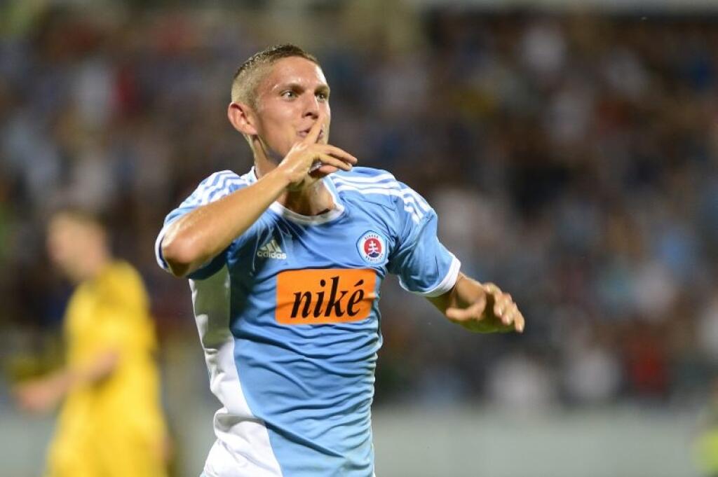 Na snímke Karol Mészáros (Slovan) sa raduje po strelení druhého gólu v úvodnom zápase 3. predkola Ligy majstrov ŠK Slovan Bratislava - Šerif Tiraspoľ (Moldavsko) 29. júla 2014 v Bratislave. FOTO TASR - Pavel Neubauer