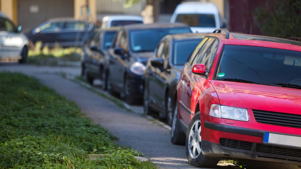 Front,View,Of,Red,Car,Parked,Partly,On,Sidewalk,On