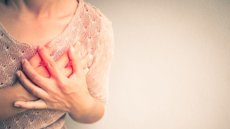 Woman having a pain in the heart attact. Medical and health care concept.