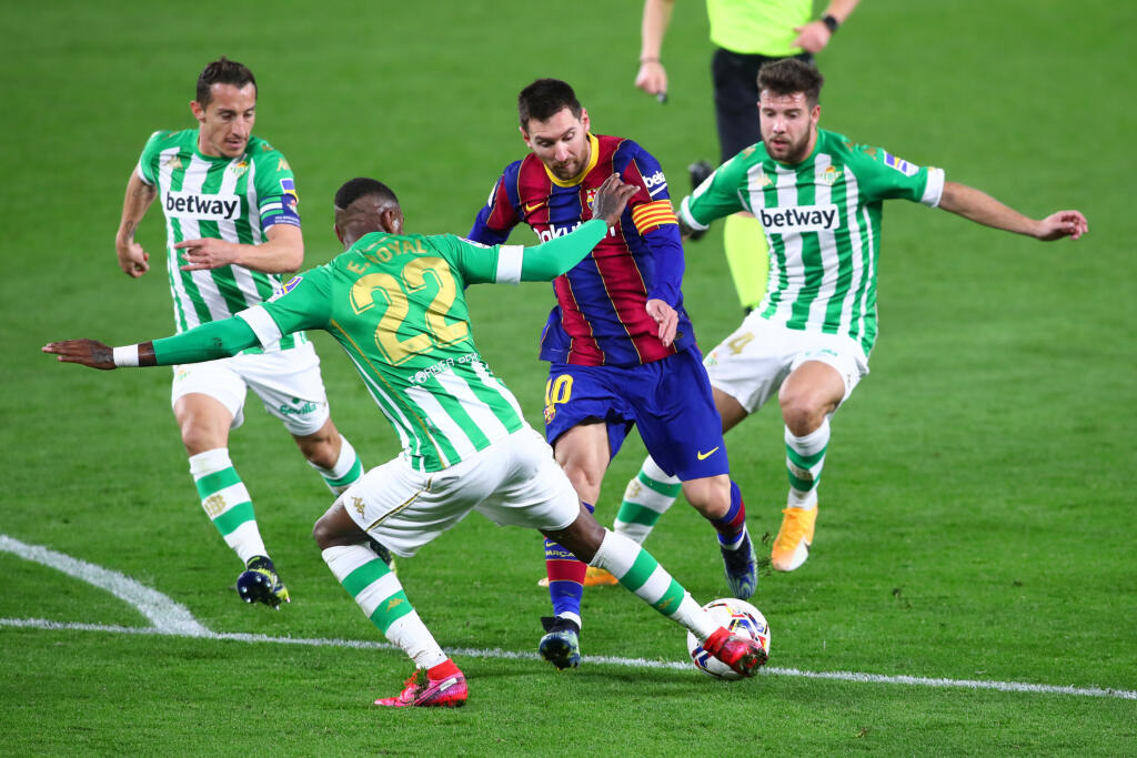 Lionel Messi proti Betisu Sevilla.