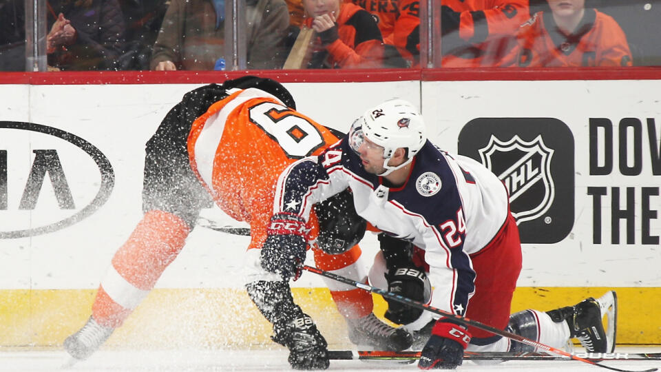 PHILADELPHIA, PENNSYLVANIA - FEBRUARY 18: Philadelphia Flyers defenseman Ivan Provorov #9 gets tangled with Columbus Blue Jackets center Nathan Gerbe #24 during the first period at the Wells Fargo Center on February 18, 2020 in Philadelphia, Pennsylvania. (Photo by Bruce Bennett/Getty Images)
