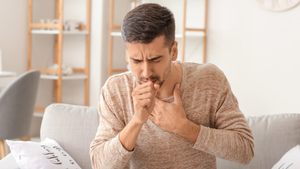 Coughing,Young,Man,At,Home