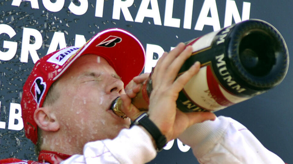 Finnish Ferrari Formula One driver Kimi Raikkonen drinks champagne as he celebrates his victory in the Australian Grand Prix in Melbourne, Sunday, March 18, 2007. (AP Photo/Steve Holland)