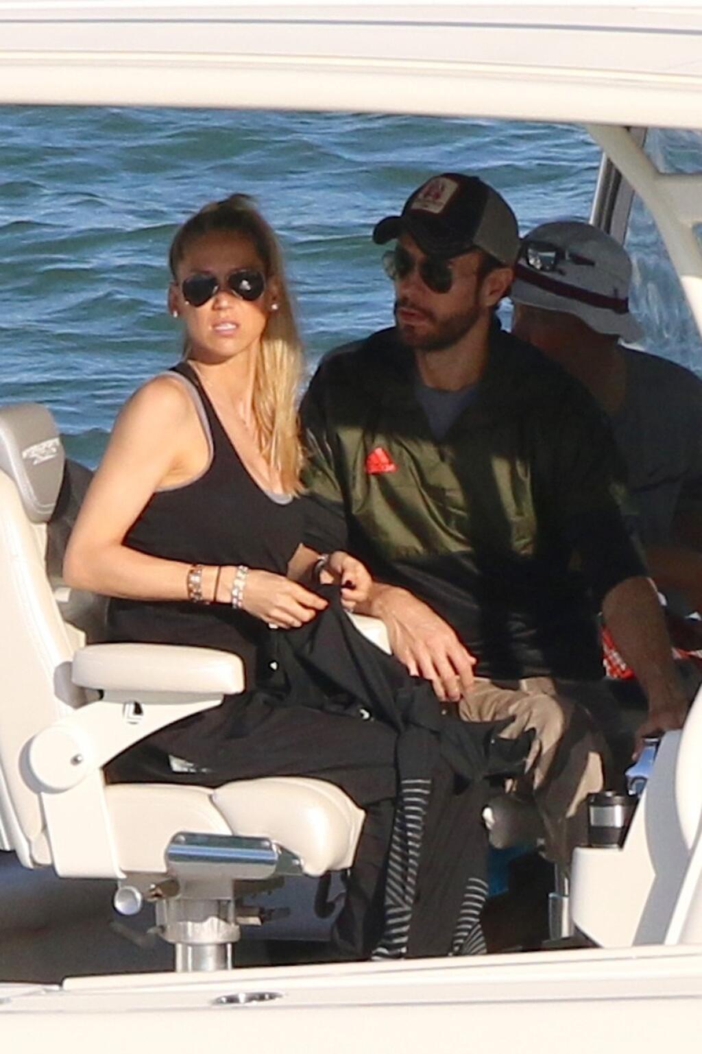 EXCLUSIVE: Enrique Iglesias and Anna Kournikova first boat ride after giving birth to twins last month in Miami.