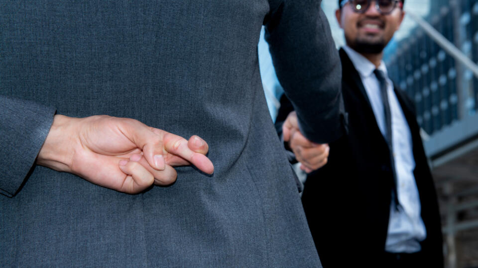 Politician,Shake,Hands,Together,And,Holding,Another,Fingers,Crossed,Behind