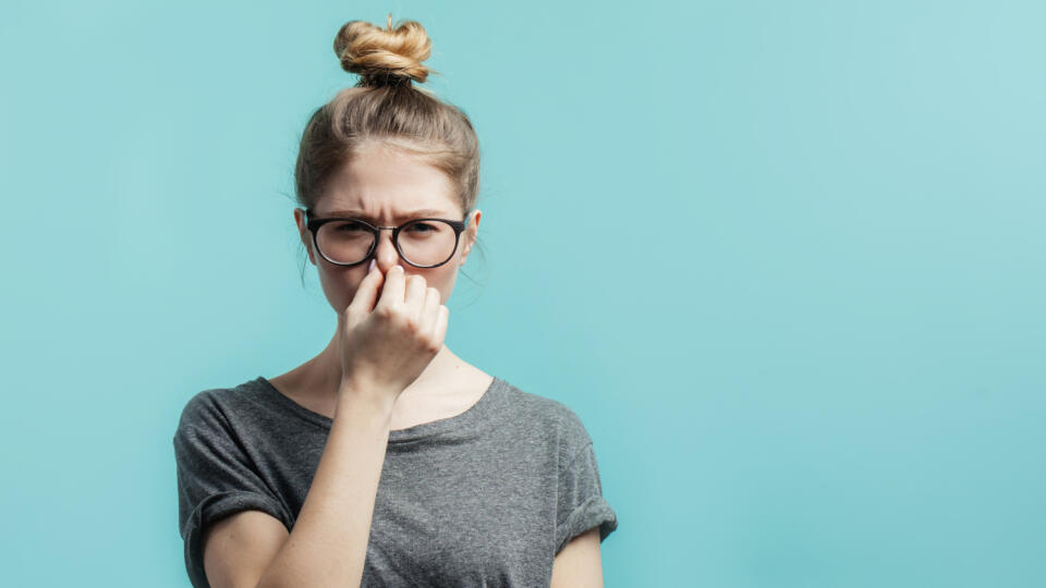 Smells,Bad,,Awful,Odor.,Young,Student,Girl,With,Hair,Bun