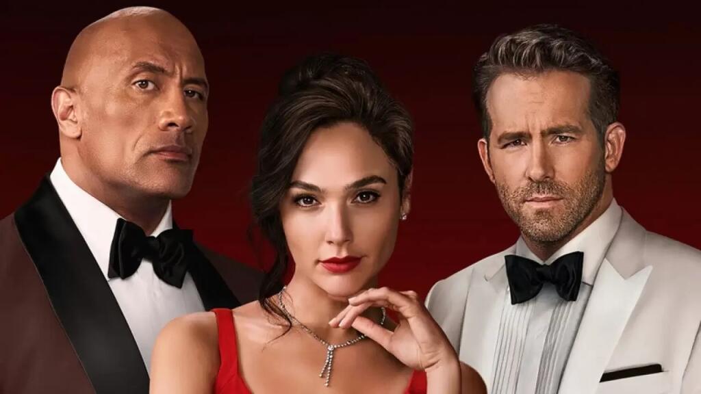 Akčný hit Red Notice (2021) s Gal Gadot, Dwaynom Johnsonom a Ryanom Reynoldsom zostáva najúspešnejším filmom Netflixu.