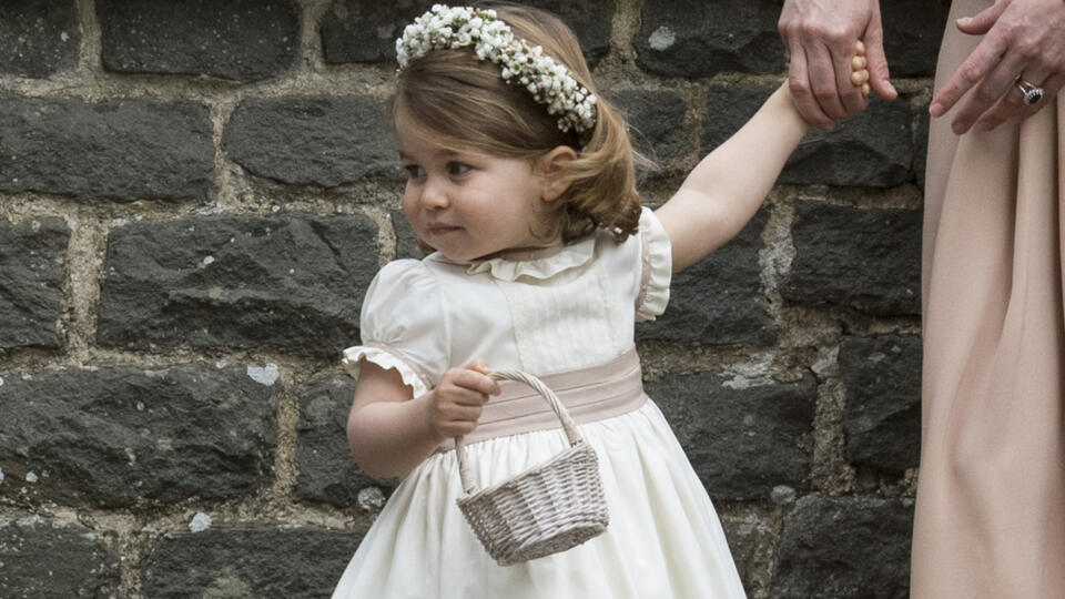 ENGLEFIELD GREEN, ENGLAND - MAY 20: Princess Charlotte of Cambridge attends the wedding of Pippa Middleton and James Matthews at St Mark's Church on May 20, 2017 in Englefield Green, England. (Photo by UK Press Pool/UK Press via Getty Images)