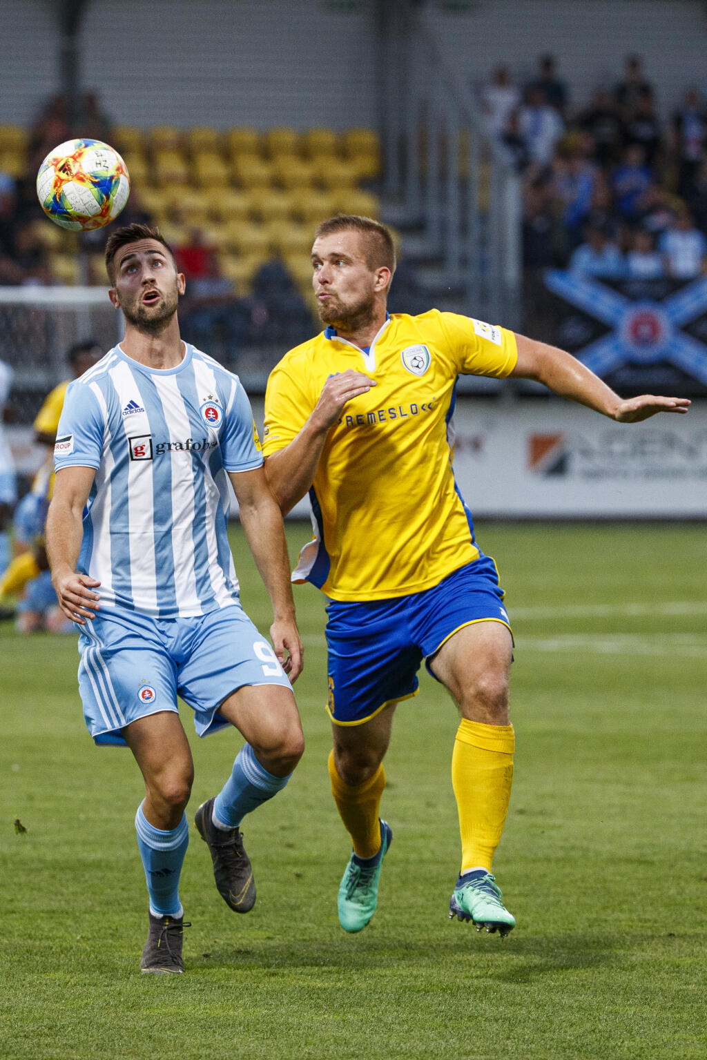 Na snímke Andraž Šporar a Patrik Jacko počas zápasu 1.kola Fortuna Ligy medzi nováčikom FK Pohronie a úradujúcim majstrom ŠK Slovan Bratislava.