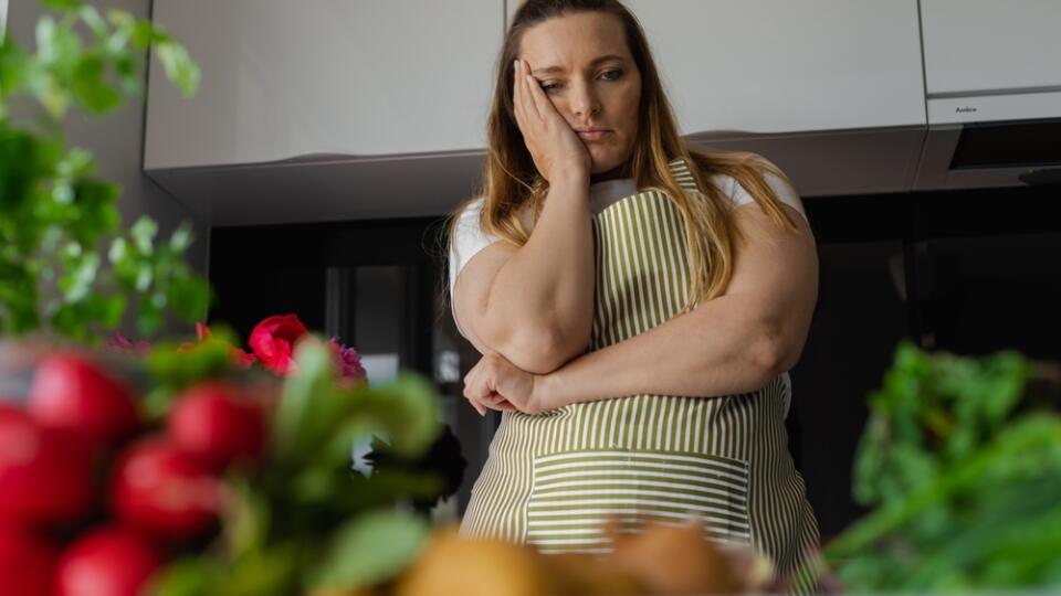 Tired,,Sad,And,Bored,Plus,Size,Blond,Woman,Holding,Head