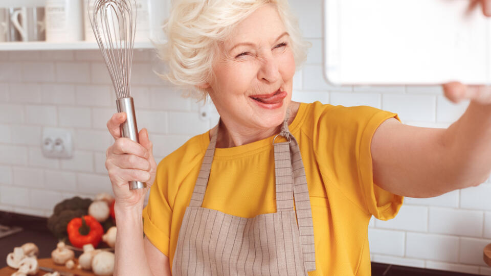 Handsome,Grandmother,Makes,Funny,Selfie,With,A,Whisk,In,The