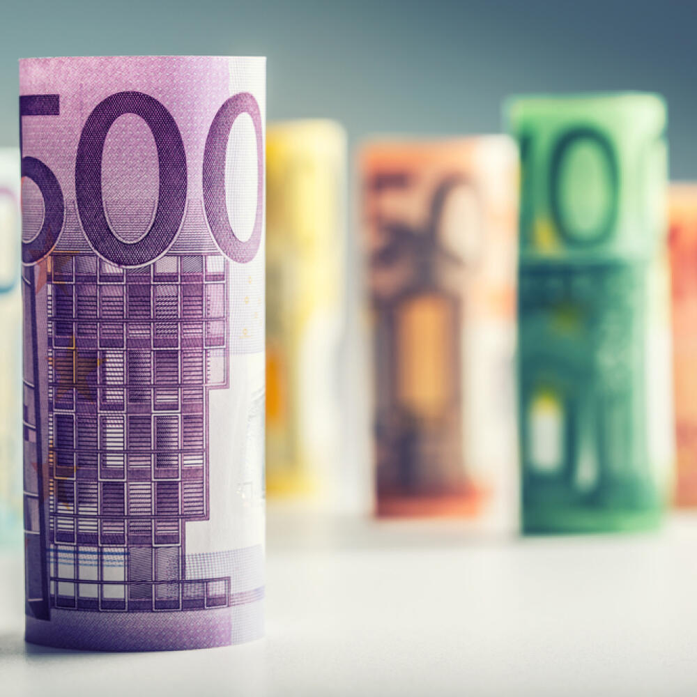Several,Hundred,Rolls,Of,Euro,Banknotes,In,Different,Positions.
