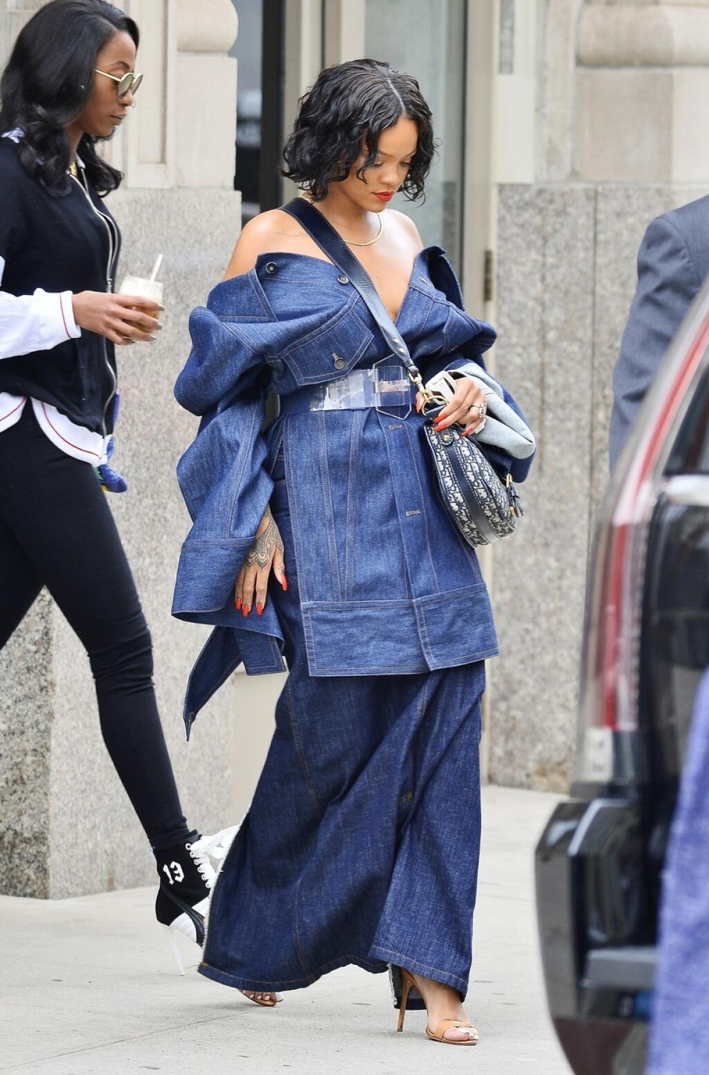 Singer and fashion designer Rihanna acknowledges applause at the end of her  Fall-Winter 2017/2018 ready-to-wear collection for Fenty as part of Paris  Fashion Week, presented in Paris, Monday March 6, 2017. (AP