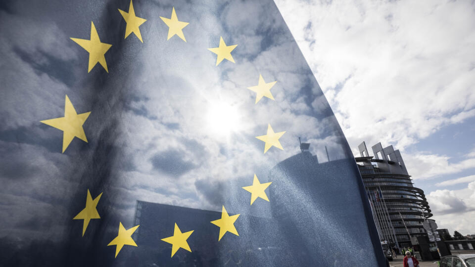 An EU flag flies at the front of the European Parliament building in Strasbourg, France, Tuesday March 26, 2019. The European Parliament is furiously debating the pros and cons of a landmark copyright bill one last time before the legislature will vote on it later. (AP Photo/Jean-Francois Badias)
