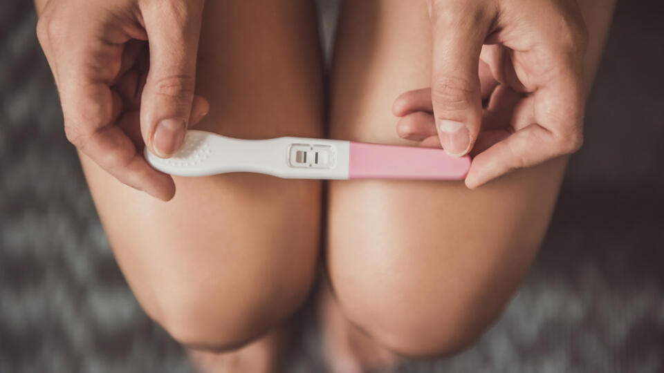 Cropped,Image,Of,Woman,Holding,A,Pregnancy,Test,On,Her