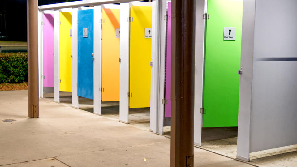 Colorful,Wc,Cabins,At,Night,In,A,City,Square.