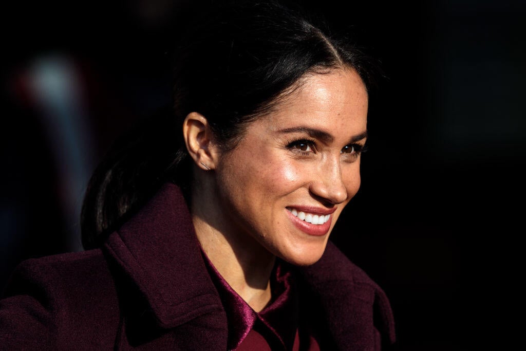 LONDON, ENGLAND - NOVEMBER 21: Meghan, The Duchess of Sussex visits the Hubb Community Kitchen to see how funds raised by the 'Together: Our Community' Cookbook are making a difference at Al Manaar, North Kensington on November 21, 2018 in London, England. (Photo by Jack Taylor/Getty Images)