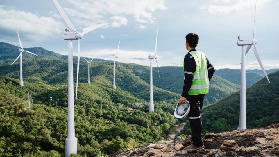 Young,Maintenance,Engineer,Man,Working,In,Wind,Turbine,On,The