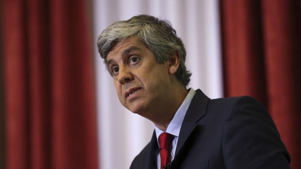 FILE - In this Feb. 5 2016 file photo, Portuguese Finance Minister Mario Centeno addresses journalists at the finance ministry in Lisbon. The finance ministers from Portugal, Luxembourg, Slovakia and Latvia are in the runoff to seek the presidency of the eurogroup, the gathering of finance chiefs of the 19 nations that use the euro. (AP Photo/Armando Franca, File)