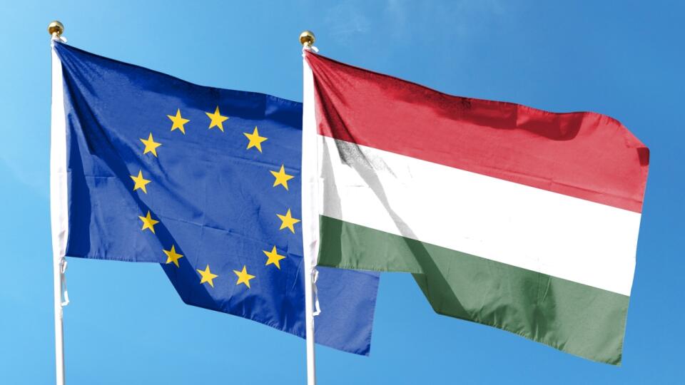 Hungary,Flag,And,Eu,Flag,On,Cloudy,Sky.,Waving,In