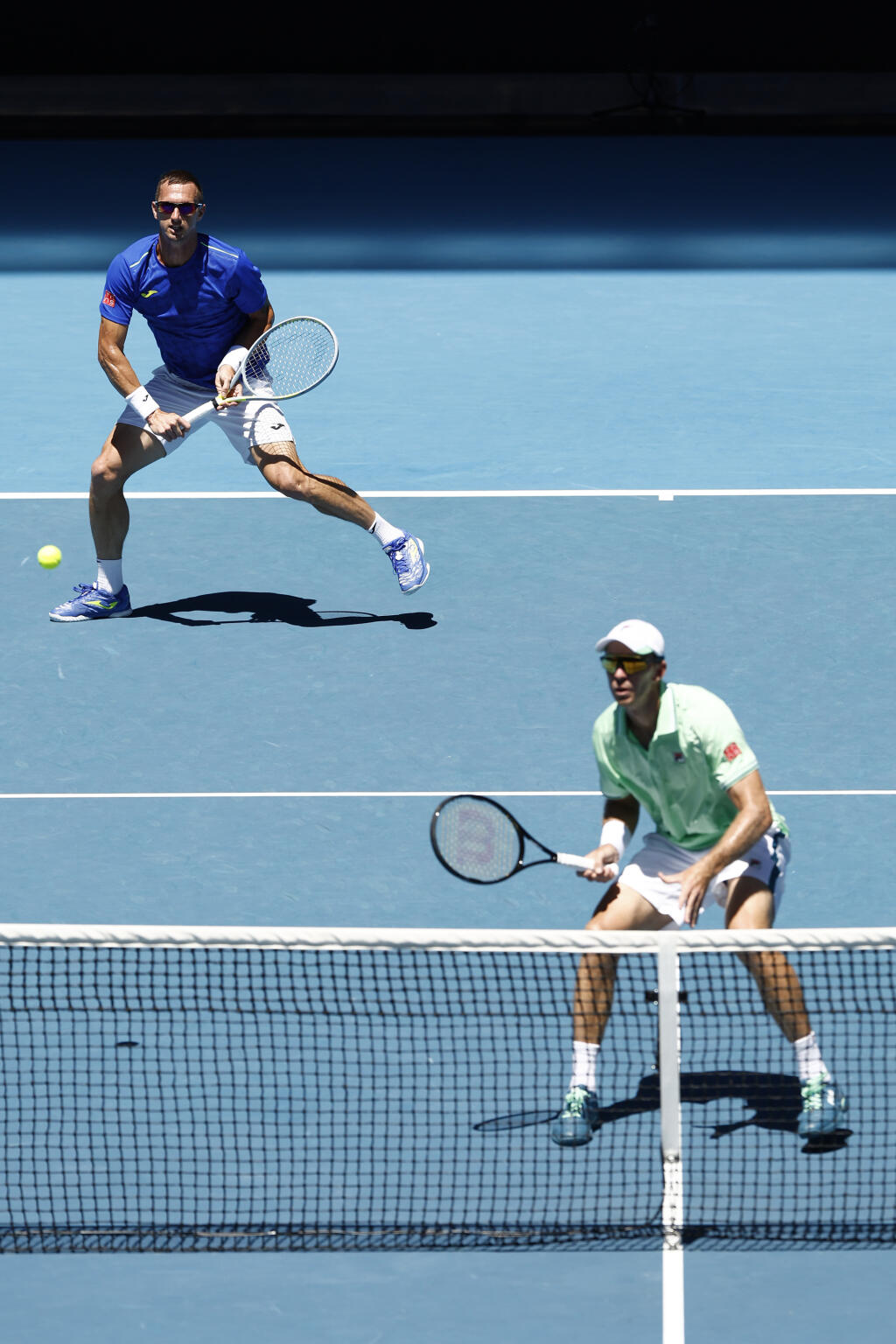 Filip Polášek a John Peers na Australian Open 2022.