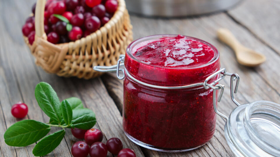 Jar,Of,Crushed,Cranberries,For,Sauce,Or,Jam,And,Basket