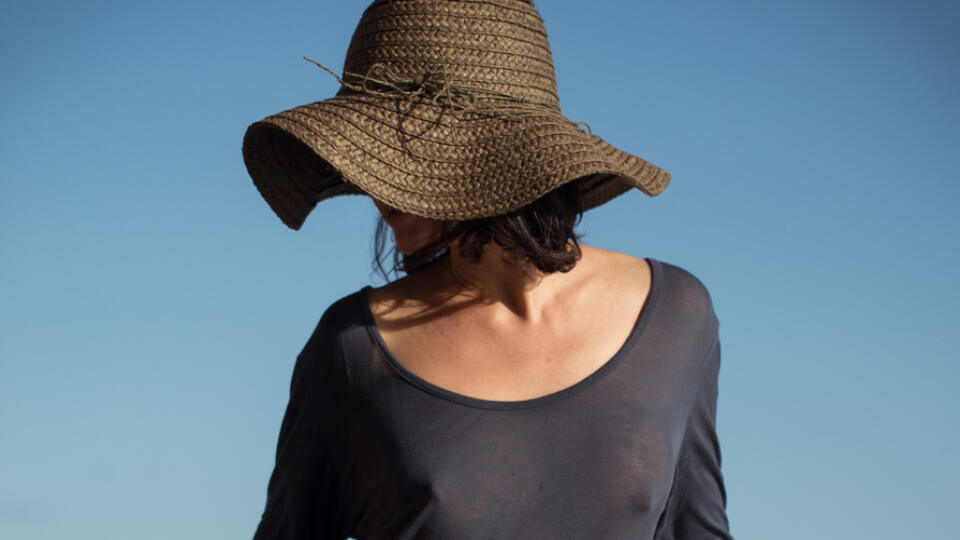 Unrecognizable,,Beautiful,Asian,Woman,Wearing,Straw,Hat,And,Thin,Grey