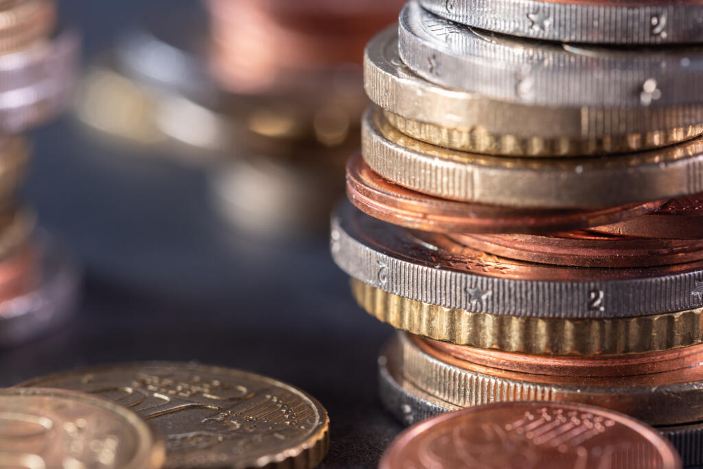 Extreme,Close-up,Of,Stacked,Up,Euro,Coins,,Out,Of,Focus