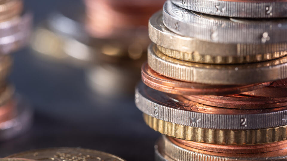 Extreme,Close-up,Of,Stacked,Up,Euro,Coins,,Out,Of,Focus